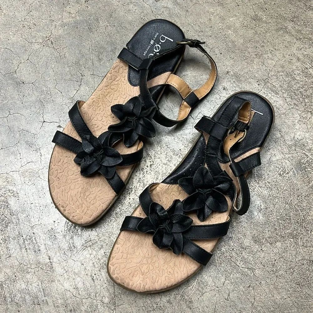 * Born international concepts, black leather sandal with leather flower detail